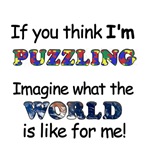 autiam asperger's puzzling word t-shirt